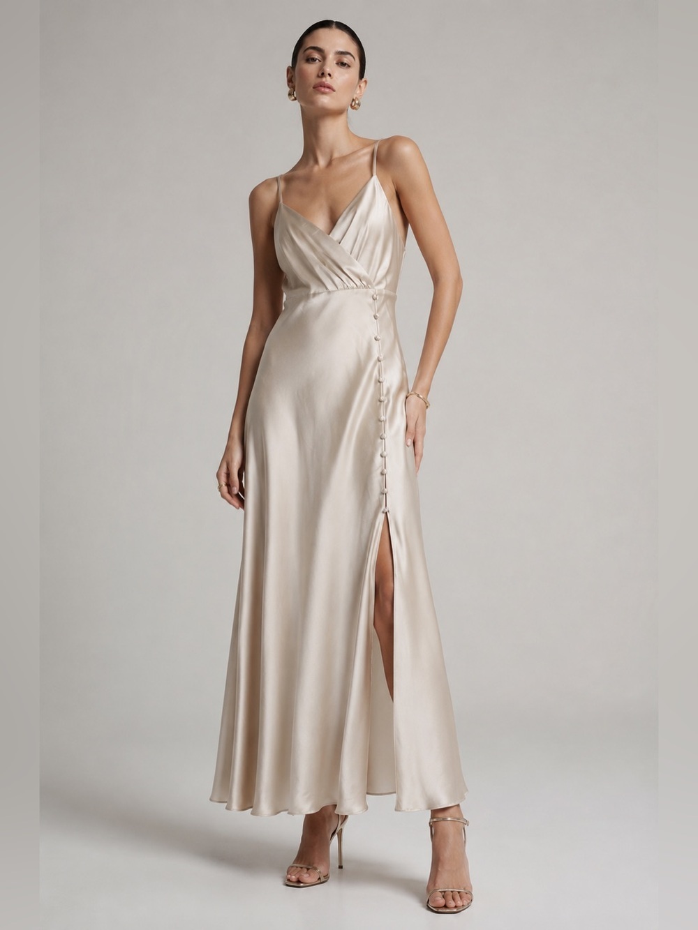 Zara champagne colored satin slip dress with side slit and button detail. Est S